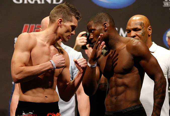 LAS VEGAS, NV - MAY 24: (L-R) Opponents Stephen Thompson and Nah-Shon Burrell face off during the UFC 160 weigh-in at the MGM Grand Garden Arena on May 24, 2013 in Las Vegas, Nevada. (Photo by Josh Hedges/Zuffa LLC/Zuffa LLC via Getty Images)