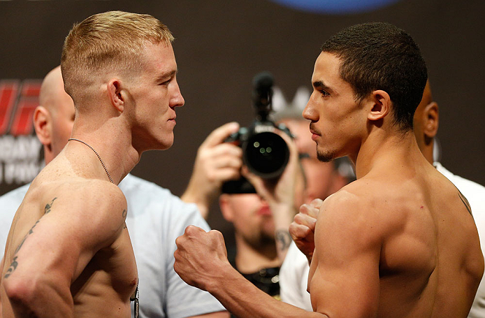 LAS VEGAS, NV - MAY 24: (L-R) Opponents Colton Smith and Robert Whittaker face off during the UFC 160 weigh-in at the MGM Grand Garden Arena on May 24, 2013 in Las Vegas, Nevada. (Photo by Josh Hedges/Zuffa LLC/Zuffa LLC via Getty Images)