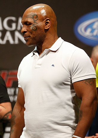 LAS VEGAS, NV - MAY 24: Former heavyweight boxing champion Mike Tyson stands on stage during the UFC 160 weigh-in at the MGM Grand Garden Arena on May 24, 2013 in Las Vegas, Nevada. (Photo by Josh Hedges/Zuffa LLC/Zuffa LLC via Getty Images)