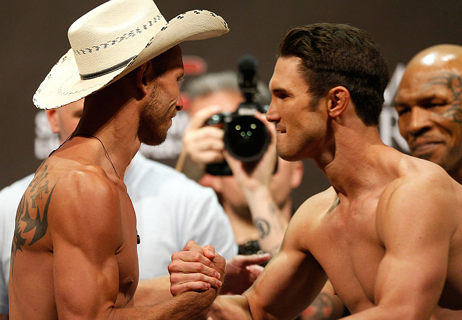 LAS VEGAS, NV - MAY 24: (L-R) Opponents Donald "Cowboy" Cerrone and Karl "K.J." Noons shake hands during the UFC 160 weigh-in at the MGM Grand Garden Arena on May 24, 2013 in Las Vegas, Nevada. (Photo by Josh Hedges/Zuffa LLC/Zuffa LLC via Getty Images