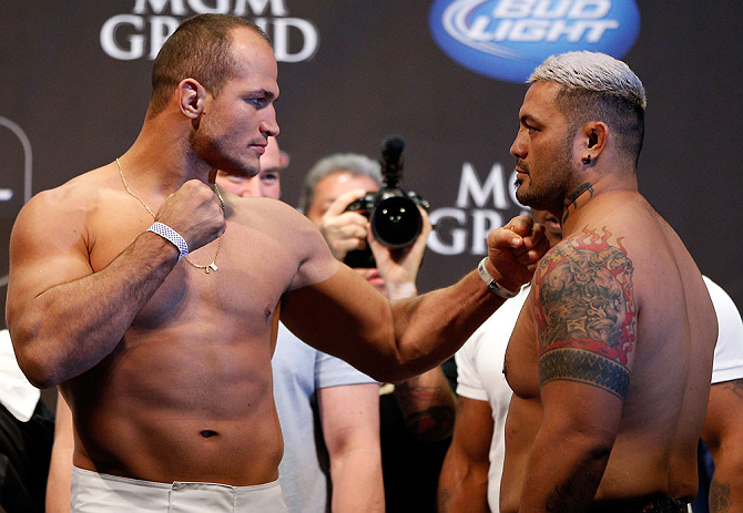 LAS VEGAS, NV - MAY 24: (L-R) Opponents Junior "Cigano" dos Santos and Mark Hunt face off during the UFC 160 weigh-in at the MGM Grand Garden Arena on May 24, 2013 in Las Vegas, Nevada. (Photo by Josh Hedges/Zuffa LLC/Zuffa LLC via Getty Images)