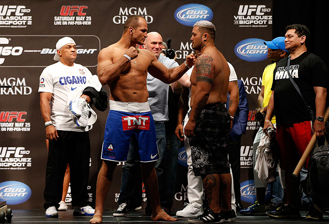 LAS VEGAS, NV - MAY 24: (L-R) Opponents Junior "Cigano" dos Santos and Mark Hunt face off during the UFC 160 weigh-in at the MGM Grand Garden Arena on May 24, 2013 in Las Vegas, Nevada. (Photo by Josh Hedges/Zuffa LLC/Zuffa LLC via Getty Images)