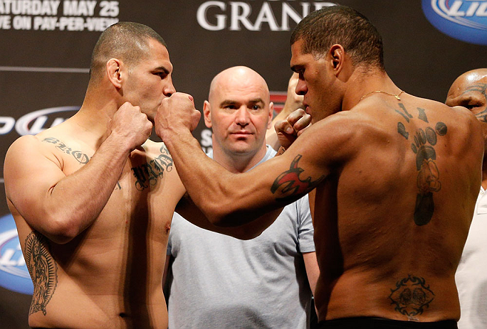 LAS VEGAS, NV - MAY 24: (L-R) Opponents Cain Velasquez and Antonio "Bigfoot" Silva face off during the UFC 160 weigh-in at the MGM Grand Garden Arena on May 24, 2013 in Las Vegas, Nevada. (Photo by Josh Hedges/Zuffa LLC/Zuffa LLC via Getty Images)
