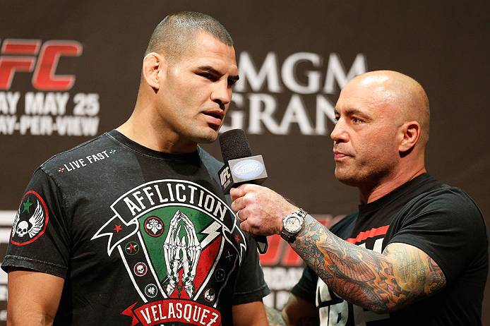 LAS VEGAS, NV - MAY 24: (L-R) Cain Velasquez is interviewed by Joe Rogan during the UFC 160 weigh-in at the MGM Grand Garden Arena on May 24, 2013 in Las Vegas, Nevada. (Photo by Josh Hedges/Zuffa LLC/Zuffa LLC via Getty Images)