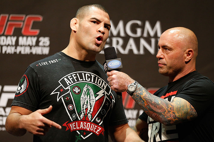 LAS VEGAS, NV - MAY 24: (L-R) Cain Velasquez is interviewed by Joe Rogan during the UFC 160 weigh-in at the MGM Grand Garden Arena on May 24, 2013 in Las Vegas, Nevada. (Photo by Josh Hedges/Zuffa LLC/Zuffa LLC via Getty Images)