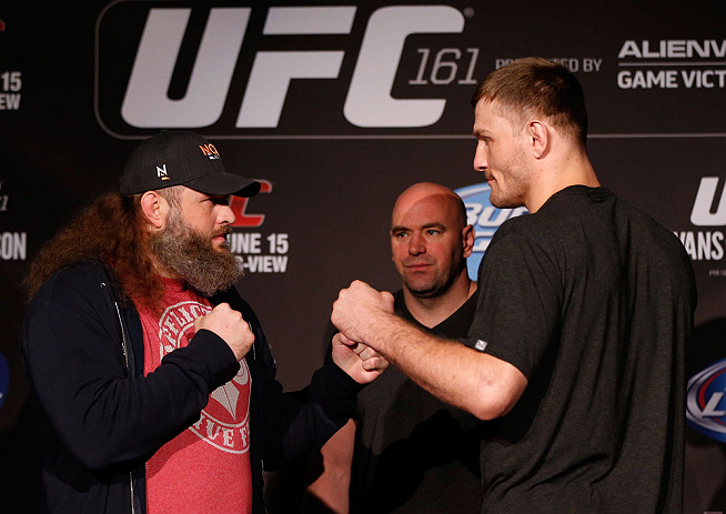 WINNIPEG, CANADA - JUNE 13: (L-R) Opponents Roy Nelson and Stipe Miocic face off during the UFC 161 media day at The Met on June 13, 2013 in Winnipeg, Manitoba, Canada. (Photo by Josh Hedges/Zuffa LLC/Zuffa LLC via Getty Images)