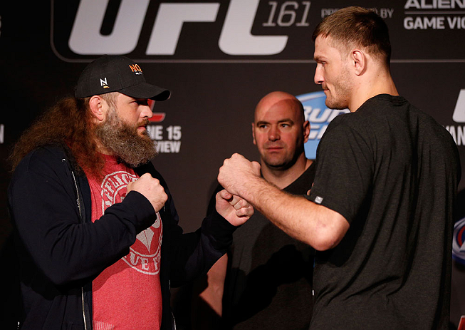WINNIPEG, CANADA - JUNE 13: (L-R) Opponents Roy Nelson and Stipe Miocic face off during the UFC 161 media day at The Met on June 13, 2013 in Winnipeg, Manitoba, Canada. (Photo by Josh Hedges/Zuffa LLC/Zuffa LLC via Getty Images)