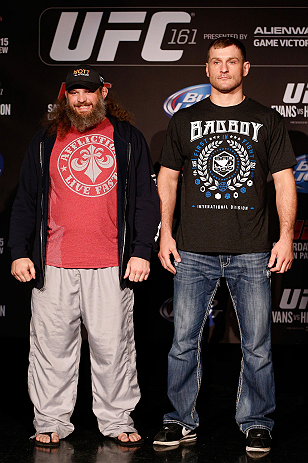 WINNIPEG, CANADA - JUNE 13: (L-R) Opponents Roy Nelson and Stipe Miocic pose for photos during the UFC 161 media day at The Met on June 13, 2013 in Winnipeg, Manitoba, Canada. (Photo by Josh Hedges/Zuffa LLC/Zuffa LLC via Getty Images)