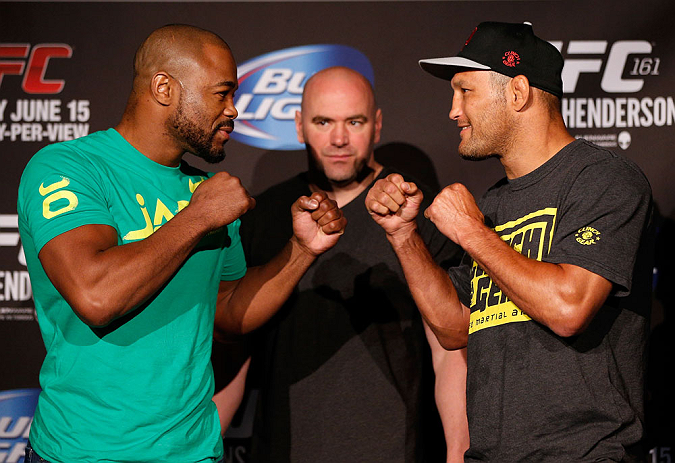 WINNIPEG, CANADA - JUNE 13: (L-R) Opponents Rashad Evans and Dan Henderson face off during the UFC 161 media day at The Met on June 13, 2013 in Winnipeg, Manitoba, Canada. (Photo by Josh Hedges/Zuffa LLC/Zuffa LLC via Getty Images)