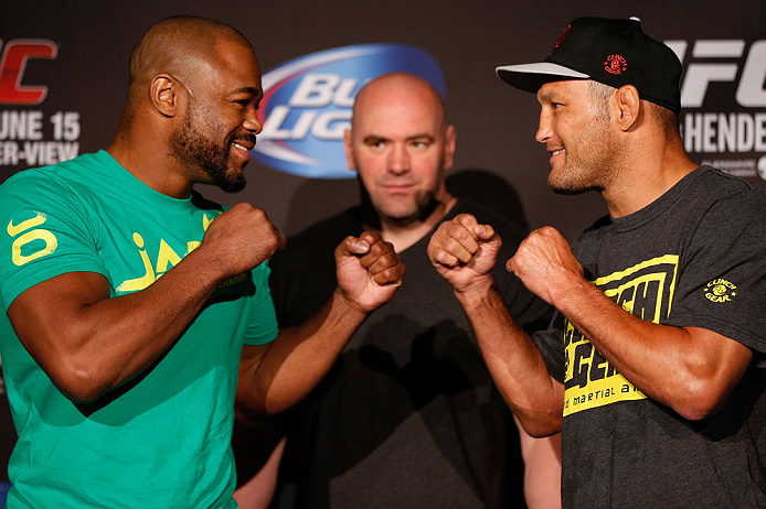 WINNIPEG, CANADA - JUNE 13: (L-R) Opponents Rashad Evans and Dan Henderson face off during the UFC 161 media day at The Met on June 13, 2013 in Winnipeg, Manitoba, Canada. (Photo by Josh Hedges/Zuffa LLC/Zuffa LLC via Getty Images)