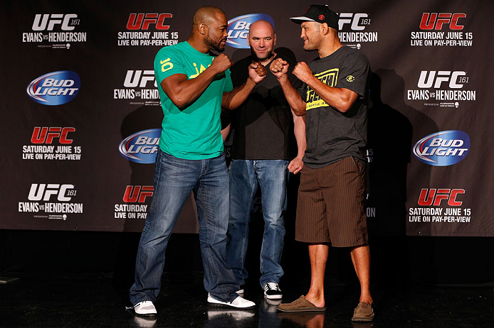 WINNIPEG, CANADA - JUNE 13: (L-R) Opponents Rashad Evans and Dan Henderson face off during the UFC 161 media day at The Met on June 13, 2013 in Winnipeg, Manitoba, Canada. (Photo by Josh Hedges/Zuffa LLC/Zuffa LLC via Getty Images)