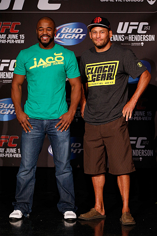 WINNIPEG, CANADA - JUNE 13: (L-R) Opponents Rashad Evans and Dan Henderson pose for photos during the UFC 161 media day at The Met on June 13, 2013 in Winnipeg, Manitoba, Canada. (Photo by Josh Hedges/Zuffa LLC/Zuffa LLC via Getty Images)
