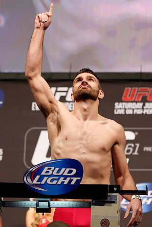 WINNIPEG, CANADA - JUNE 14: John Maguire weighs in during the UFC 161 weigh-in at the MTS Centre on June 14, 2013 in Winnipeg, Manitoba, Canada. (Photo by Josh Hedges/Zuffa LLC/Zuffa LLC via Getty Images)