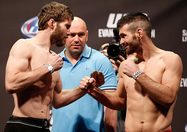 WINNIPEG, CANADA - JUNE 14: (L-R) Opponents Mitch Clarke and John Maguire face off during the UFC 161 weigh-in at the MTS Centre on June 14, 2013 in Winnipeg, Manitoba, Canada. (Photo by Josh Hedges/Zuffa LLC/Zuffa LLC via Getty Images)