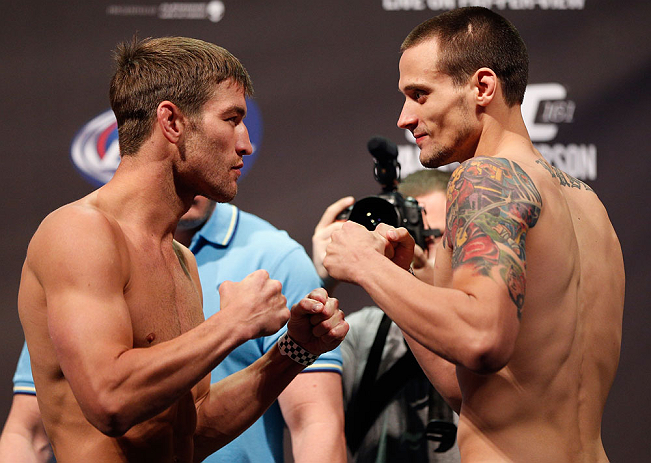 WINNIPEG, CANADA - JUNE 14: (L-R) Opponents Sam Stout and James Krause face off during the UFC 161 weigh-in at the MTS Centre on June 14, 2013 in Winnipeg, Manitoba, Canada. (Photo by Josh Hedges/Zuffa LLC/Zuffa LLC via Getty Images)