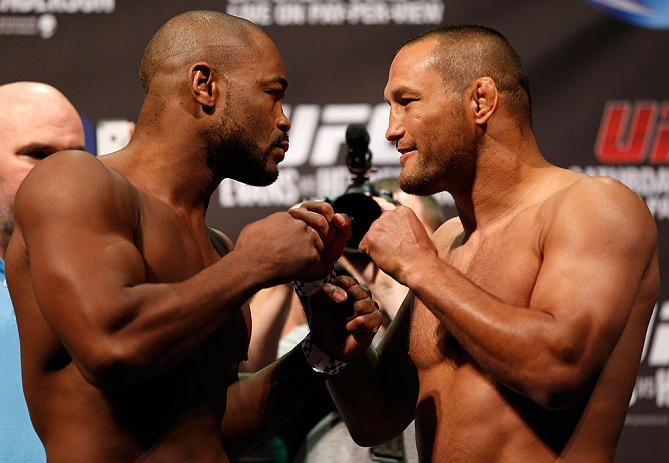 WINNIPEG, CANADA - JUNE 14: (L-R) Opponents Rashad Evans and Dan Henderson face off during the UFC 161 weigh-in at the MTS Centre on June 14, 2013 in Winnipeg, Manitoba, Canada. (Photo by Josh Hedges/Zuffa LLC/Zuffa LLC via Getty Images)