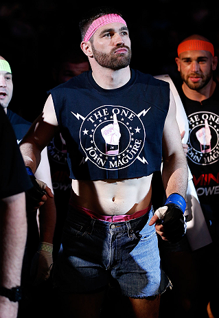 WINNIPEG, CANADA - JUNE 15: John Maguire enters the arena before his lightweight fight against Mitch Clarke during the UFC 161 event at the MTS Centre on June 15, 2013 in Winnipeg, Manitoba, Canada. (Photo by Josh Hedges/Zuffa LLC/Zuffa LLC via Getty Im