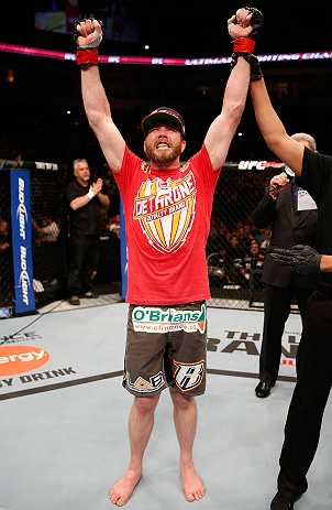 WINNIPEG, CANADA - JUNE 15: Mitch Clarke reacts after his split decision victory over John Maguire in their lightweight fight during the UFC 161 event at the MTS Centre on June 15, 2013 in Winnipeg, Manitoba, Canada. (Photo by Josh Hedges/Zuffa LLC/Zuff