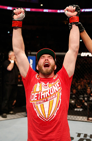 WINNIPEG, CANADA - JUNE 15: Mitch Clarke reacts after his split decision victory over John Maguire in their lightweight fight during the UFC 161 event at the MTS Centre on June 15, 2013 in Winnipeg, Manitoba, Canada. (Photo by Josh Hedges/Zuffa LLC/Zuff