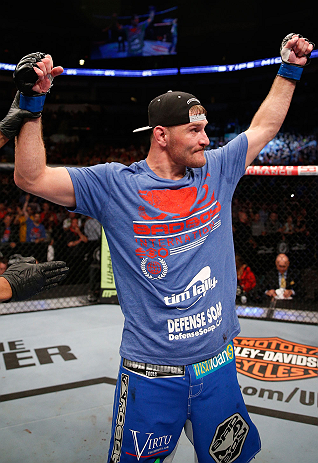 WINNIPEG, CANADA - JUNE 15: Stipe Miocic reacts after his victory over Roy Nelson in their heavyweight fight during the UFC 161 event at the MTS Centre on June 15, 2013 in Winnipeg, Manitoba, Canada. (Photo by Josh Hedges/Zuffa LLC/Zuffa LLC via Getty I