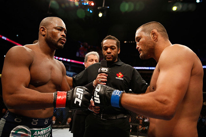 WINNIPEG, CANADA - JUNE 15: (L-R) Opponents Rashad Evans and Dan Henderson touch gloves before their light heavyweight fight during the UFC 161 event at the MTS Centre on June 15, 2013 in Winnipeg, Manitoba, Canada. (Photo by Josh Hedges/Zuffa LLC/Zuffa