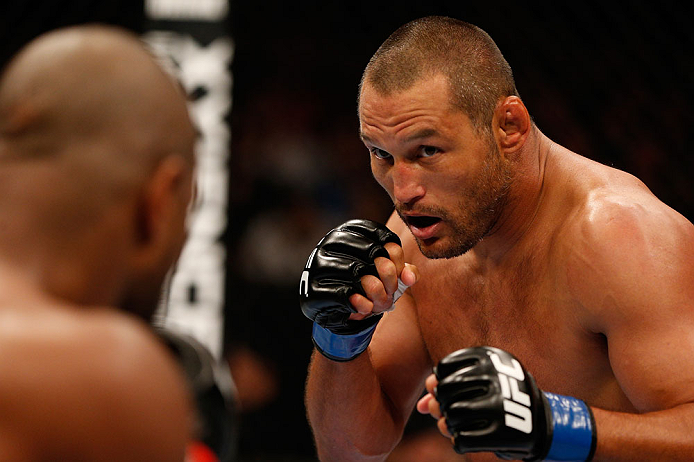 WINNIPEG, CANADA - JUNE 15: (R-L) Dan Henderson squares off with Rashad Evans in their light heavyweight fight during the UFC 161 event at the MTS Centre on June 15, 2013 in Winnipeg, Manitoba, Canada. (Photo by Josh Hedges/Zuffa LLC/Zuffa LLC via Getty