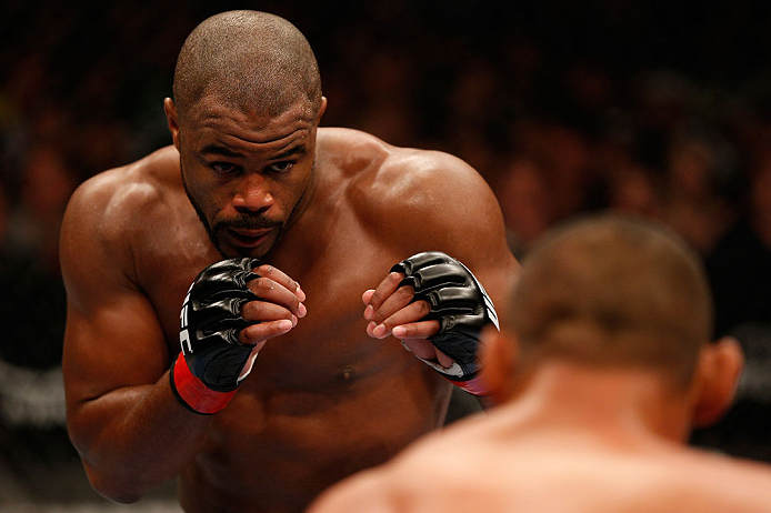 WINNIPEG, CANADA - JUNE 15: (L-R) Rashad Evans punches squares off with Dan Henderson in their light heavyweight fight during the UFC 161 event at the MTS Centre on June 15, 2013 in Winnipeg, Manitoba, Canada. (Photo by Josh Hedges/Zuffa LLC/Zuffa LLC v