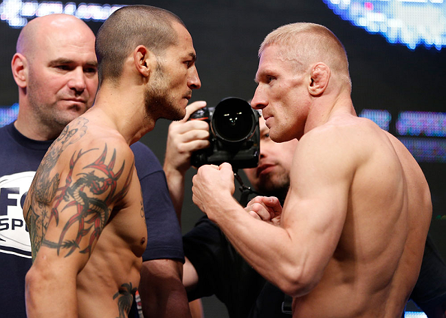 LAS VEGAS, NV - JULY 05: (L-R) Opponents Cub Swanson and Dennis Siver face off during the UFC 162 weigh-in at the Mandalay Bay Events Center on July 5, 2013 in Las Vegas, Nevada. (Photo by Josh Hedges/Zuffa LLC/Zuffa LLC via Getty Images)