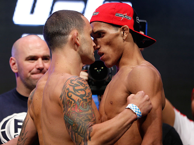 LAS VEGAS, NV - JULY 05: (L-R) Opponents Frankie Edgar and Charles Oliveira face off during the UFC 162 weigh-in at the Mandalay Bay Events Center on July 5, 2013 in Las Vegas, Nevada. (Photo by Josh Hedges/Zuffa LLC/Zuffa LLC via Getty Images)