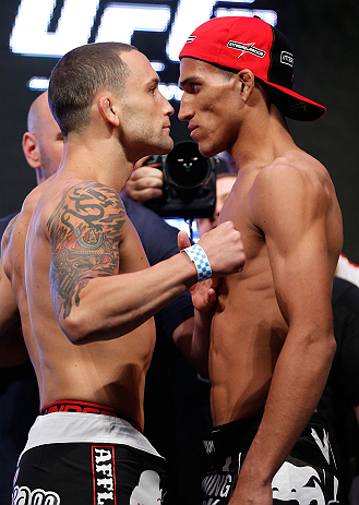 LAS VEGAS, NV - JULY 05: (L-R) Opponents Frankie Edgar and Charles Oliveira face off during the UFC 162 weigh-in at the Mandalay Bay Events Center on July 5, 2013 in Las Vegas, Nevada. (Photo by Josh Hedges/Zuffa LLC/Zuffa LLC via Getty Images)