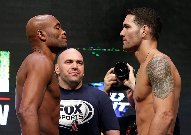 LAS VEGAS, NV - JULY 05: (L-R) Opponents Anderson Silva and Chris Weidman face off during the UFC 162 weigh-in at the Mandalay Bay Events Center on July 5, 2013 in Las Vegas, Nevada. (Photo by Josh Hedges/Zuffa LLC/Zuffa LLC via Getty Images)