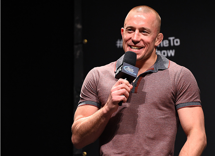 MONTREAL, QC - APRIL 24: Former UFC welterweight champion Georges St-Pierre interacts with fans during a Q&A session before the UFC 186 weigh-in at Metropolis on April 24, 2015 in Montreal, Quebec, Canada. (Photo by Josh Hedges/Zuffa LLC/Zuffa LLC via G
