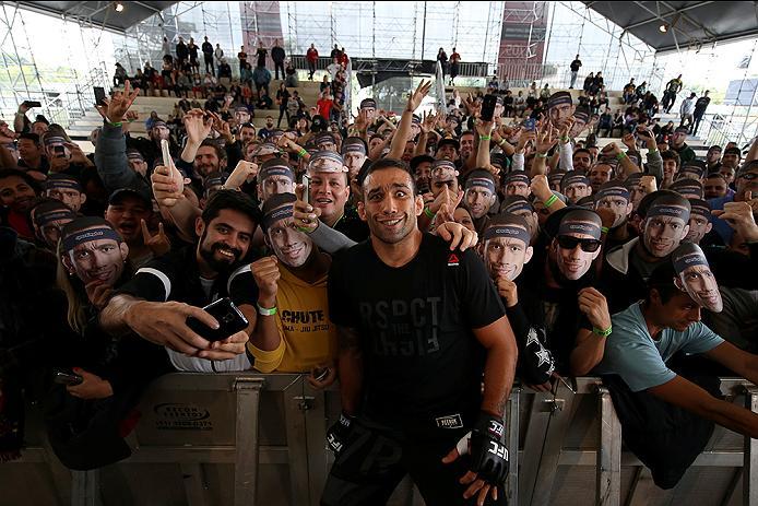 RIO DE JANEIRO, BRAZIL - MAY 11: Heavyweight champion Fabricio Verdum of Brazil takes photos with fans during an open training session at Arena da Baixada stadium on May 11, 2016 in Curitiba, Brazil. (Photo by Buda Mendes/Zuffa LLC/Zuffa LLC via Getty Ima