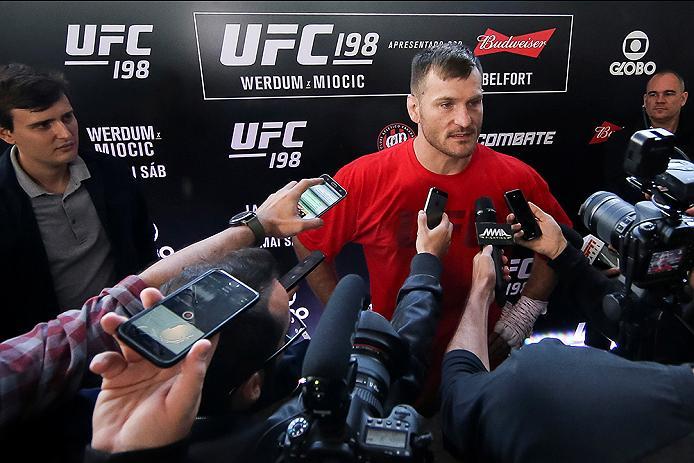 RIO DE JANEIRO, BRAZIL - MAY 11: Heavyweight contender Stipe Miocic (C) of the United States speaks to the media after an open training session at Arena da Baixada stadium on May 11, 2016 in Curitiba, Brazil. (Photo by Buda Mendes/Zuffa LLC/Zuffa LLC via
