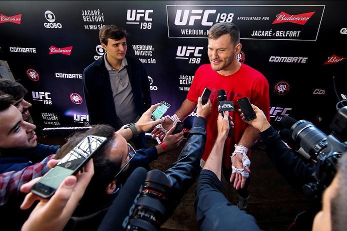 RIO DE JANEIRO, BRAZIL - MAY 11: Heavyweight contender Stipe Miocic (C) of the United States speaks to the media after an open training session at Arena da Baixada stadium on May 11, 2016 in Curitiba, Brazil. (Photo by Buda Mendes/Zuffa LLC/Zuffa LLC via
