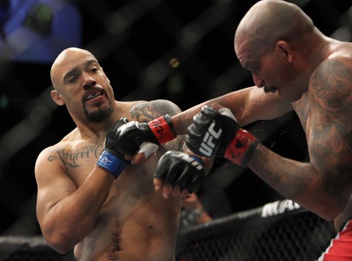 CHICAGO, IL - JANUARY 28: (L-R) Lavar Johnson punches Joey Beltran during the UFC on FOX event at United Center on January 28, 2012 in Chicago, Illinois. (Photo by Josh Hedges/Zuffa LLC/Zuffa LLC via Getty Images) *** Local Caption *** Lavar Johnson; Jo