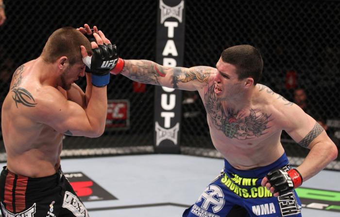 CHICAGO, IL - JANUARY 28: (R-L) Chris Camozzi punches Dustin Jacoby during the UFC on FOX event at United Center on January 28, 2012 in Chicago, Illinois. (Photo by Nick Laham/Zuffa LLC/Zuffa LLC via Getty Images) *** Local Caption *** Chris Camozzi; Du