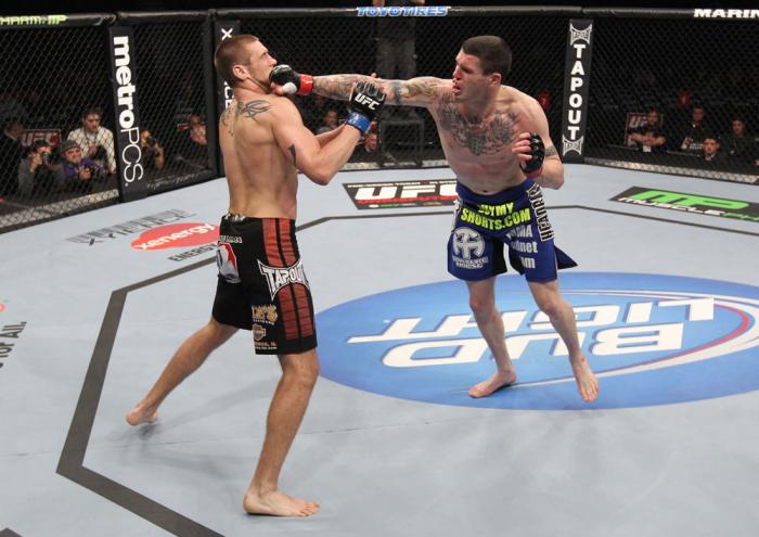 CHICAGO, IL - JANUARY 28: (R-L) Chris Camozzi punches Dustin Jacoby during the UFC on FOX event at United Center on January 28, 2012 in Chicago, Illinois. (Photo by Nick Laham/Zuffa LLC/Zuffa LLC via Getty Images) *** Local Caption *** Chris Camozzi; Du