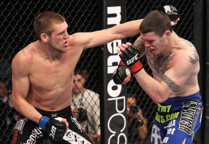 CHICAGO, IL - JANUARY 28: (L-R) Dustin Jacoby punches Chris Camozzi during the UFC on FOX event at United Center on January 28, 2012 in Chicago, Illinois. (Photo by Nick Laham/Zuffa LLC/Zuffa LLC via Getty Images) *** Local Caption *** Chris Camozzi; Du
