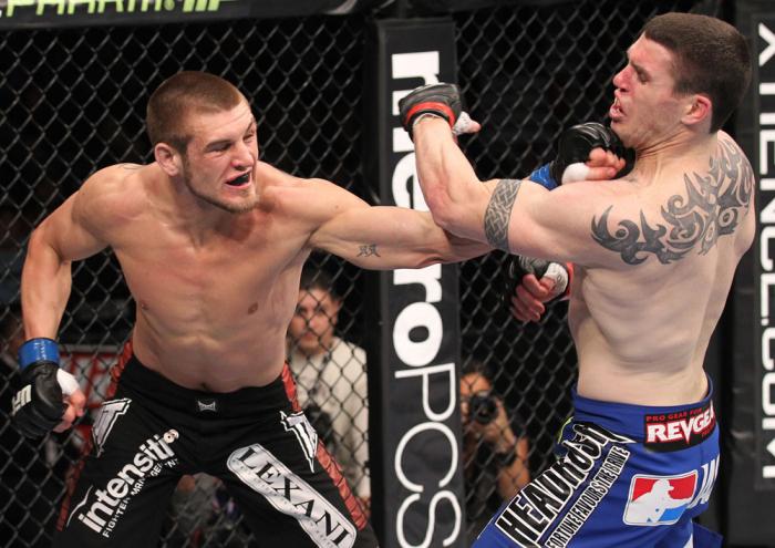 CHICAGO, IL - JANUARY 28: (L-R) Dustin Jacoby punches Chris Camozzi during the UFC on FOX event at United Center on January 28, 2012 in Chicago, Illinois. (Photo by Nick Laham/Zuffa LLC/Zuffa LLC via Getty Images) *** Local Caption *** Chris Camozzi; Du