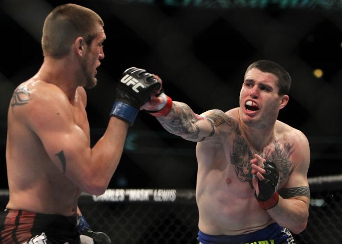 CHICAGO, IL - JANUARY 28: (R-L) Chris Camozzi punches Dustin Jacoby during the UFC on FOX event at United Center on January 28, 2012 in Chicago, Illinois. (Photo by Josh Hedges/Zuffa LLC/Zuffa LLC via Getty Images) *** Local Caption *** Chris Camozzi; D