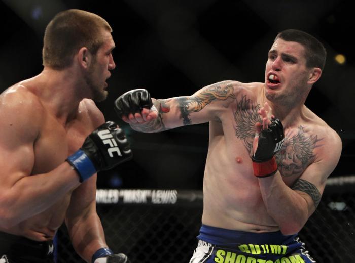 CHICAGO, IL - JANUARY 28: (R-L) Chris Camozzi punches Dustin Jacoby during the UFC on FOX event at United Center on January 28, 2012 in Chicago, Illinois. (Photo by Josh Hedges/Zuffa LLC/Zuffa LLC via Getty Images) *** Local Caption *** Chris Camozzi; D
