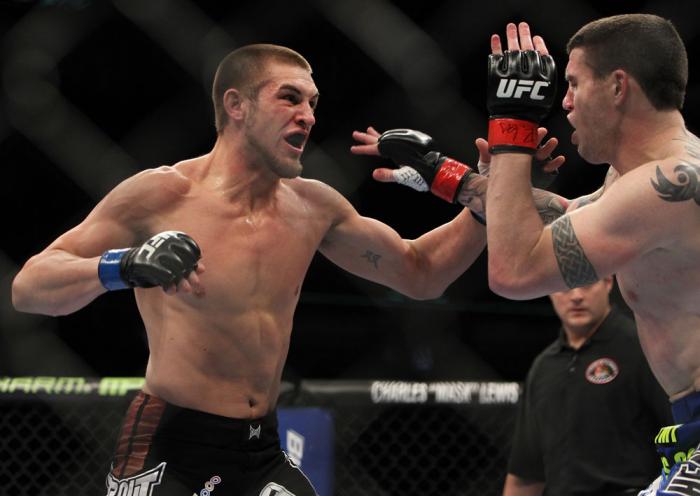 CHICAGO, IL - JANUARY 28: (L-R) Dustin Jacoby punches Chris Camozzi during the UFC on FOX event at United Center on January 28, 2012 in Chicago, Illinois. (Photo by Josh Hedges/Zuffa LLC/Zuffa LLC via Getty Images) *** Local Caption *** Chris Camozzi; D
