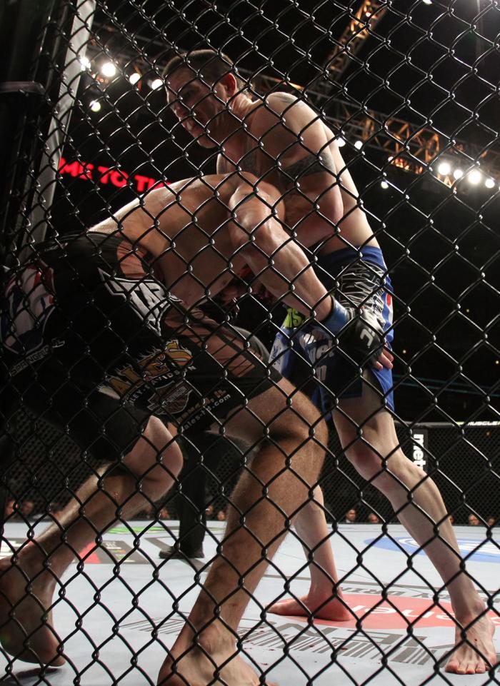 CHICAGO, IL - JANUARY 28: (R-L) Chris Camozzi defeats Dustin Jacoby with a guillotine choke submission during the UFC on FOX event at United Center on January 28, 2012 in Chicago, Illinois. (Photo by Josh Hedges/Zuffa LLC/Zuffa LLC via Getty Images) ***