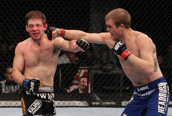 CHICAGO, IL - JANUARY 28: (R-L) Evan Dunham punches Nik Lentz during the UFC on FOX event at United Center on January 28, 2012 in Chicago, Illinois. (Photo by Nick Laham/Zuffa LLC/Zuffa LLC via Getty Images) *** Local Caption *** Nik Lentz; Evan Dunham