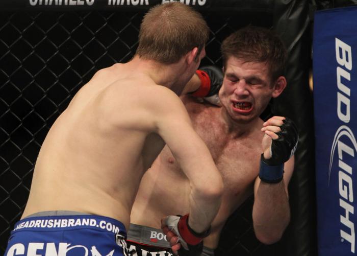 CHICAGO, IL - JANUARY 28: (L-R) Evan Dunham punches Nik Lentz during the UFC on FOX event at United Center on January 28, 2012 in Chicago, Illinois. (Photo by Josh Hedges/Zuffa LLC/Zuffa LLC via Getty Images) *** Local Caption *** Nik Lentz; Evan Dunham