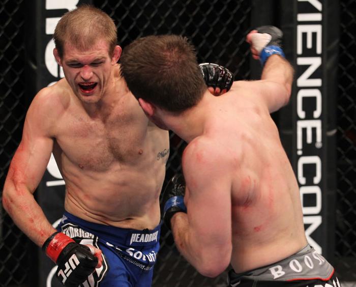 CHICAGO, IL - JANUARY 28: (L-R) Evan Dunham punches Nik Lentz during the UFC on FOX event at United Center on January 28, 2012 in Chicago, Illinois. (Photo by Nick Laham/Zuffa LLC/Zuffa LLC via Getty Images) *** Local Caption *** Nik Lentz; Evan Dunham