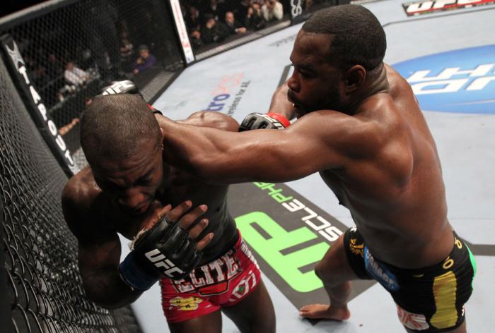 CHICAGO, IL - JANUARY 28: (R-L) Rashad Evans punches Phil Davis during the UFC on FOX event at United Center on January 28, 2012 in Chicago, Illinois. (Photo by Nick Laham/Zuffa LLC/Zuffa LLC via Getty Images) *** Local Caption *** Rashad Evans; Phil Da