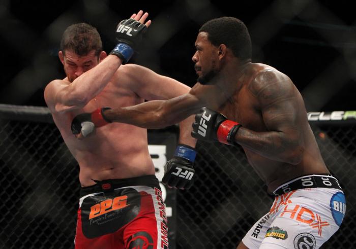 CHICAGO, IL - JANUARY 28: (R-L) Michael Johnson punches Shane Roller during the UFC on FOX event at United Center on January 28, 2012 in Chicago, Illinois. (Photo by Josh Hedges/Zuffa LLC/Zuffa LLC via Getty Images) *** Local Caption *** Michael Johnson