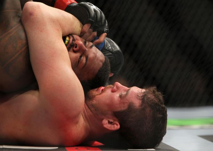 CHICAGO, IL - JANUARY 28: (R-L) Shane Roller attempts a rear choke submission against Michael Johnson during the UFC on FOX event at United Center on January 28, 2012 in Chicago, Illinois. (Photo by Josh Hedges/Zuffa LLC/Zuffa LLC via Getty Images) ***